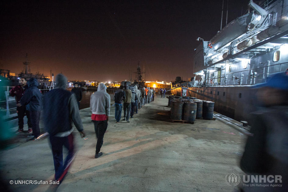 Libya. Refugees and migrants disembarking at Tripoli naval base